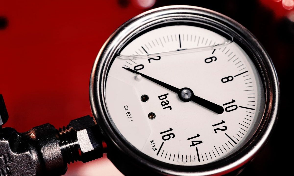 Close-up of an air pressure gauge showing the bar scale