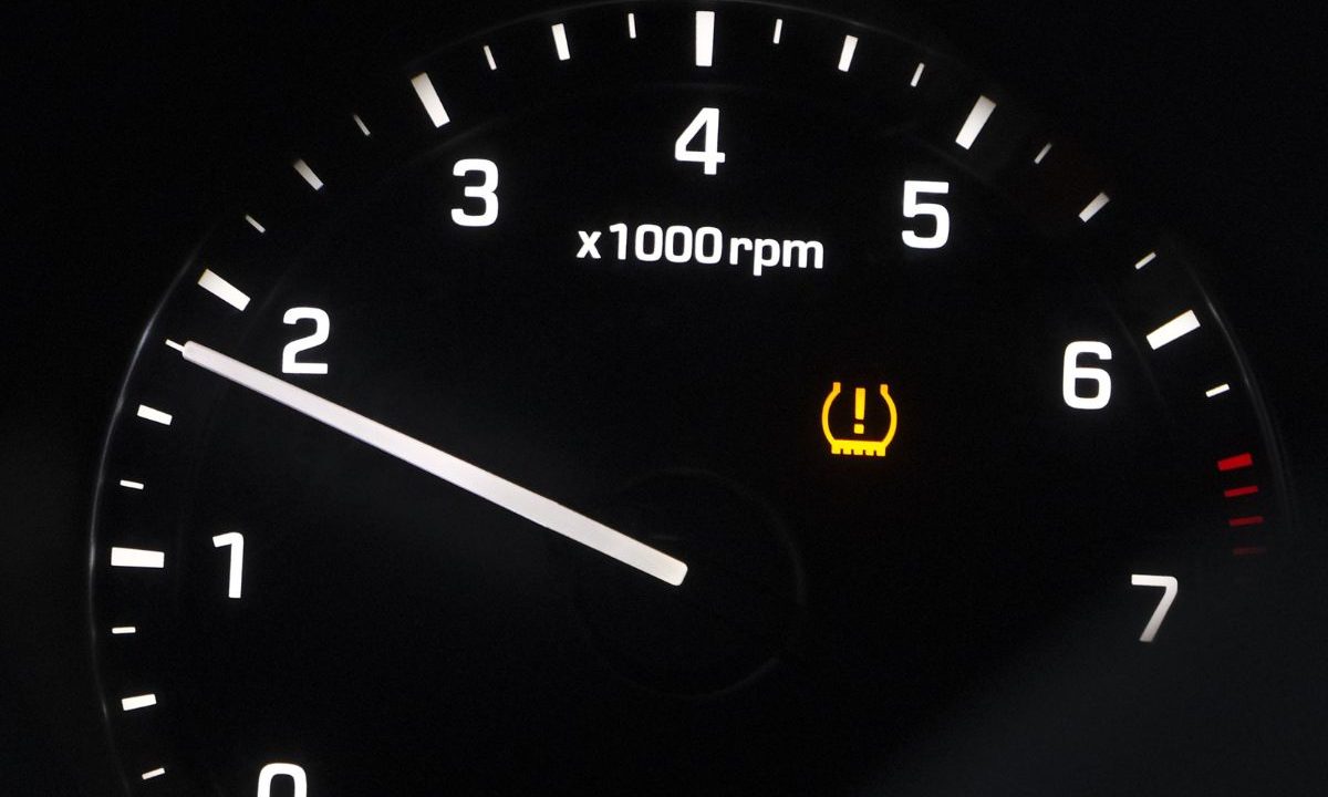 TPMS tire pressure warning light on a car dashboard